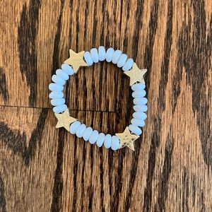 Gold & White Bracelets.